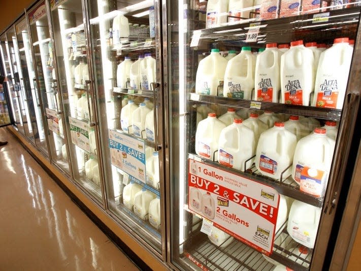 The milk section of a grocery store is pictured in Los Angeles April 7, 2011.