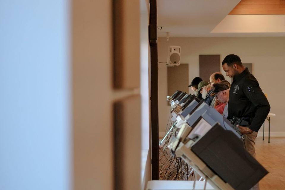 Voters line up at the voting booths on election day in Columbus, Ga. on Nov. 6, 2018.