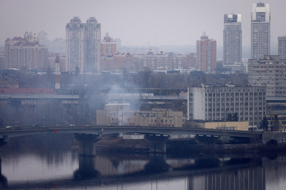 KYIV, UKRAINE - FEBRUARY 24: Smoke rises from outside an intelligence building on February 24, 2022 in Kyiv, Ukraine. Overnight, Russia began a large-scale attack on Ukraine, with explosions reported in multiple cities and far outside the restive eastern regions held by Russian-backed rebels. (Photo by Chris McGrath/Getty Images)
