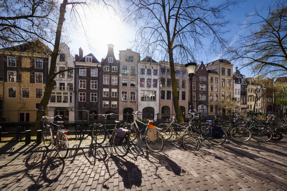 Bikes parked along a canal in Utrecht.