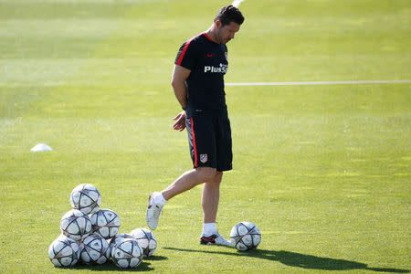 Football Soccer - Atletico Madrid training - Majadahonda, Spain -21/5/16- Atletico Madrid's coach Diego Simeone attends a training session in Majadahonda. REUTERS/Juan Medina