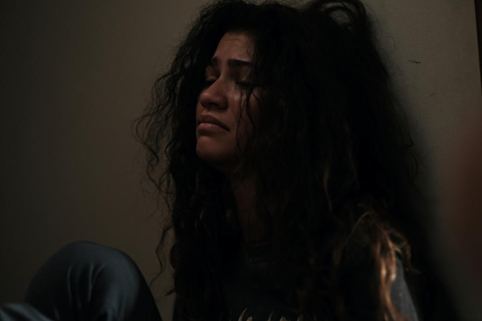 A young woman looking distressed and tearful; still from "Euphoria."