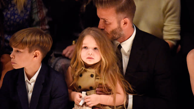 Harper Beckham could not look any more angelic. The 3-year-old daughter of David and Victoria Beckham stole all of the attention at the Burberry's "London in Los Angeles" fashion show on Thursday night. If you just want to pitch her cheeks, you're not alone. As she sits on her dad’s knee, she looks absolutely adorable in a beige dress with big buttons. <strong> PHOTOS: Stars and Their Adorable Tots </strong> Even <em>Vogue's </em>Anna Wintour's serious gaze looks softened as she can’t help but look at how cute Harper is through her classic shades. <strong> NEWS: Brooklyn Beckham's First Official Fashion Campaign </strong> This fashion show was truly a family event as Harper was also joined by big brothers Brooklyn, 16, Romeo, 12, and Cruz, 10. Romeo is no stranger to Burberry as he showed off his dance moves in their ads last November. Could little Harper be their next face? See how Romeo shined in the ad campaign below.