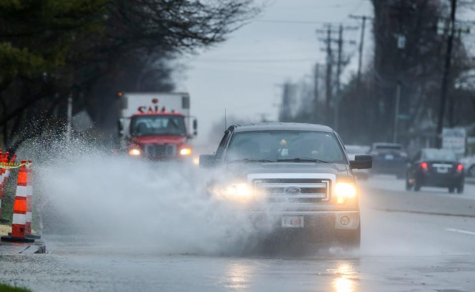 Along New Cut Road near Iroquois Park, heavy rains caused flooding of some traffic lanes Friday morning. March 3, 2023. 