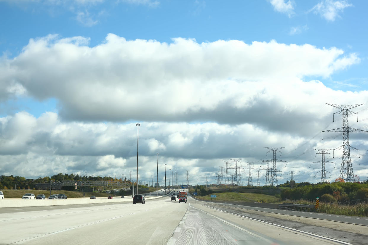 Richmond Hill, Ontario, Canada - October 8, 2016: Clouds over the tall road - highway 407 eastbound in Richmond Hill, Ontario, Canada on a beautiful day in October 2016