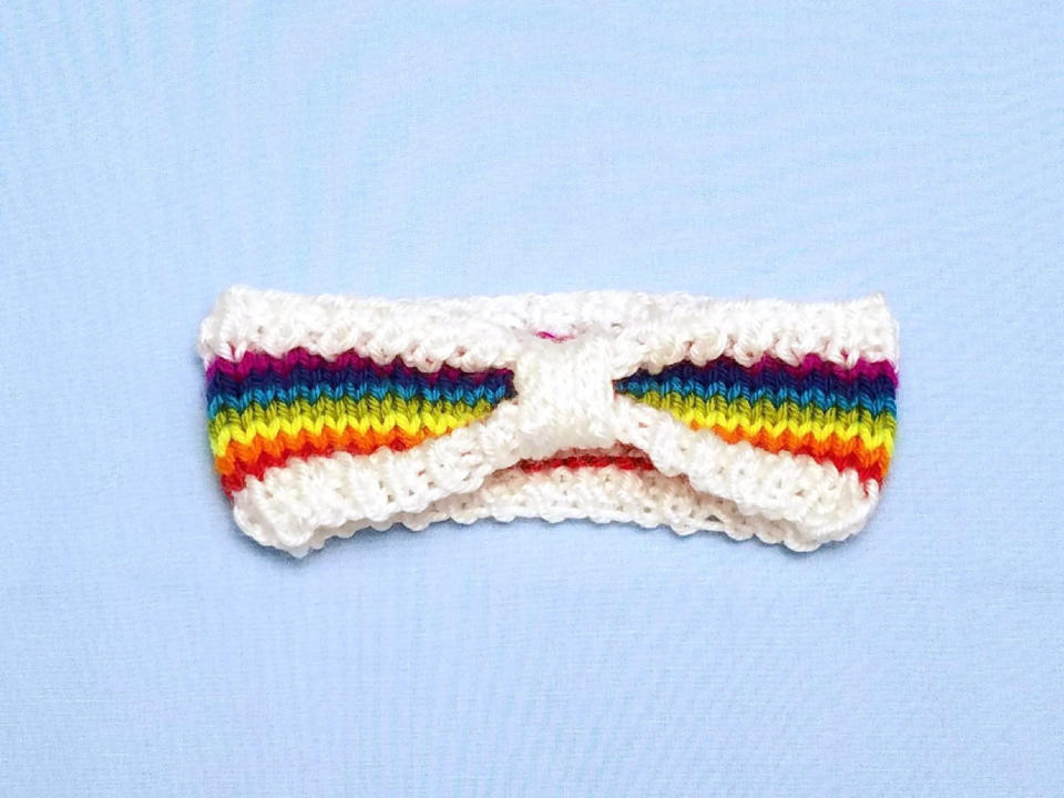 $9.95, <a href="https://www.etsy.com/listing/181346606/rainbow-baby-headband-rainbow-newborn" target="_blank">DesignsbyLeahC</a>