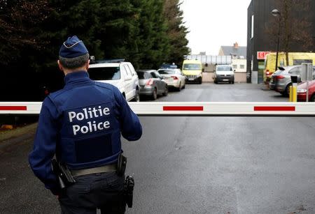 A Belgian police officer stands at the entrance of the emergency service of the Cliniques de l'Europe Sint-Elisabeth hospital where Democratic Republic of Congo's veteran opposition leader Etienne Tshisekedi died yesterday, in Brussels, Belgium, February 2, 2017. REUTERS/Francois Lenoir