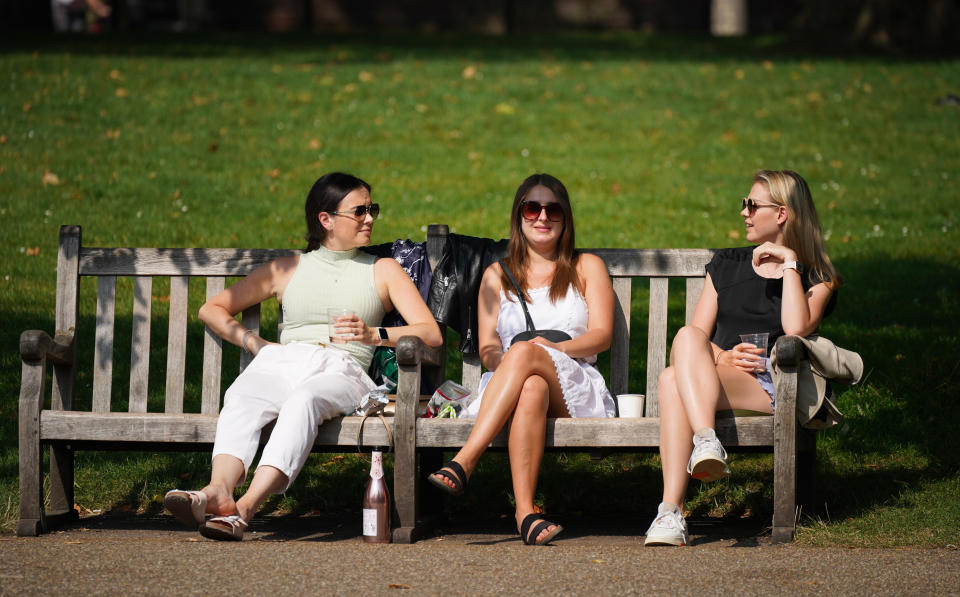 <p>People enjoy the sun in St James's Park, London. Parts of the UK could see an official heatwave in the coming days, with temperatures hitting almost 30C (86F), forecasters have said. Picture date: Sunday September 5, 2021. (Photo by Yui Mok/PA Images via Getty Images)</p>
