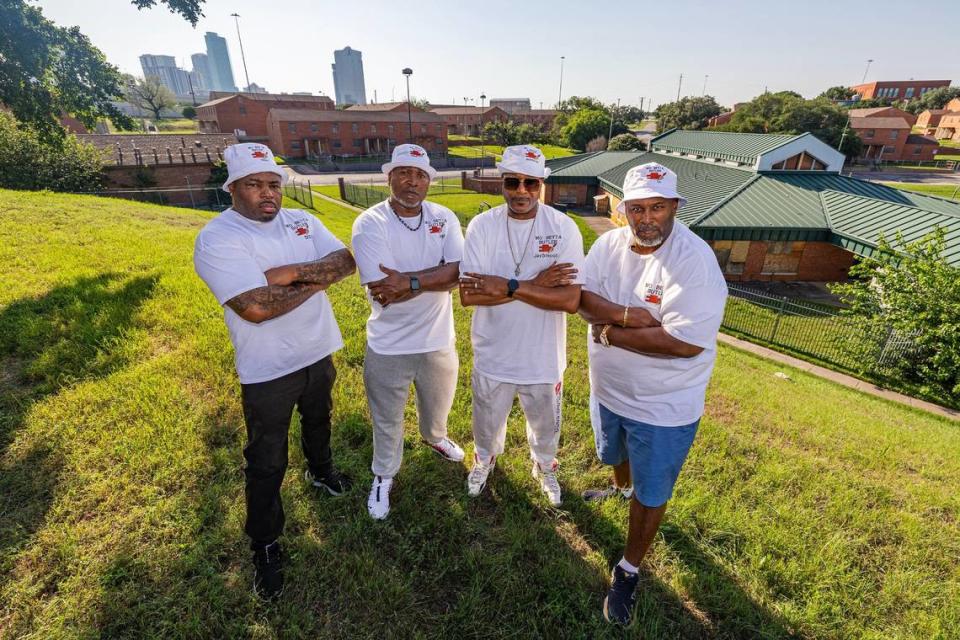 Former Butler Place residents, from left, Tremayne Kilgore, LC Timms, Joe Collier and Greg Wilson are photographed in Butler Place, the neighborhood where they grew up just outside of downtown Fort Worth. They remember it as a place where people looked out for each other.