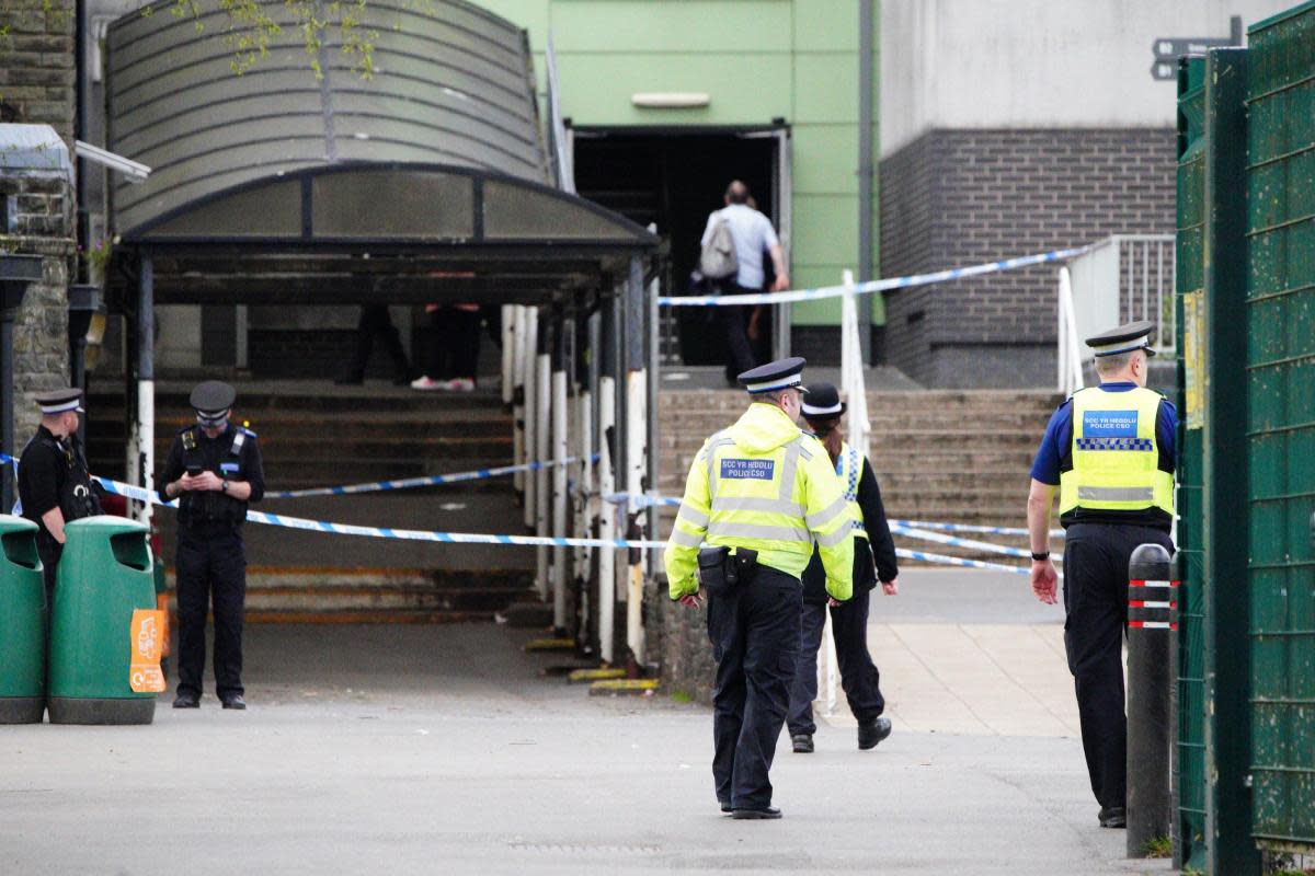 Police at Amman Valley school, in Ammanford, Carmarthenshire <i>(Image: PA)</i>