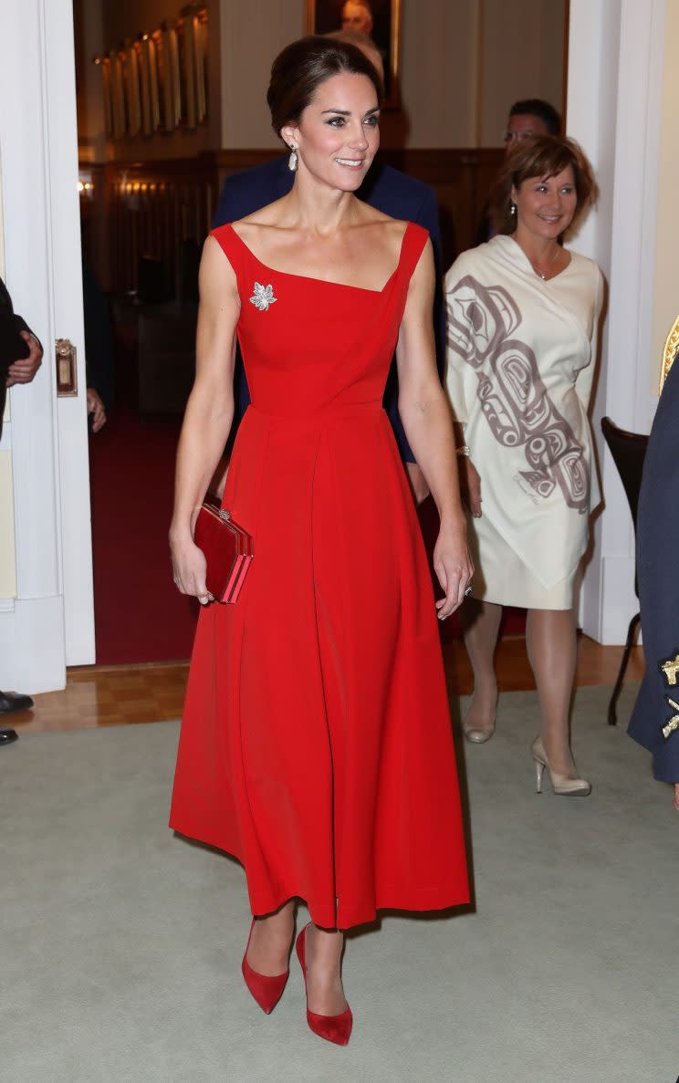 <i>The Duchess has been opting for designer looks this year. She has two versions of this $1700 Preen dress: one in red, the other black (Photo: PA)</i>