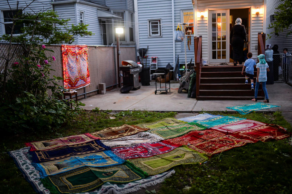 Prayer rugs lie in the backyard of a home during Ramadan in Bayonne, N.J. (Amr Alfiky / Reuters file)