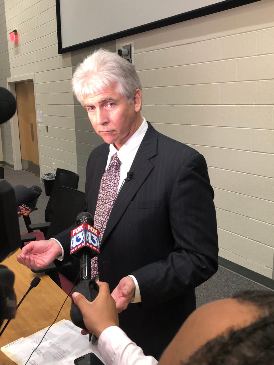 Gary Lilly speaks with reporters Thursday evening after being named superintendent of Collierville Schools.