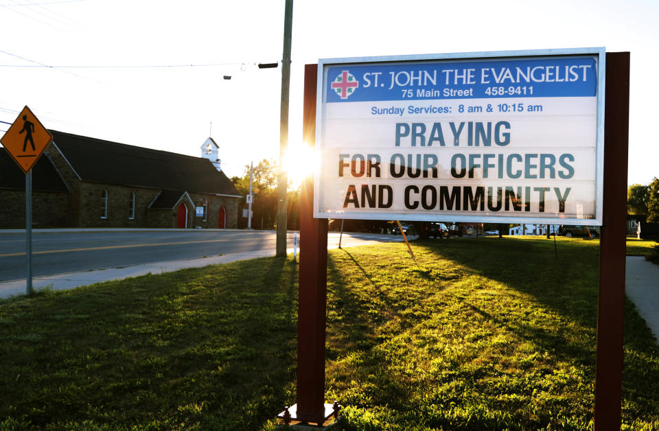 <p>A message at the St. John the Evangelist Anglican Church notifies the community of a prayer vigil after a shooting incident in Fredericton on Aug. 10, 2018. (Photo from Reuters/Dan Culberson) </p>