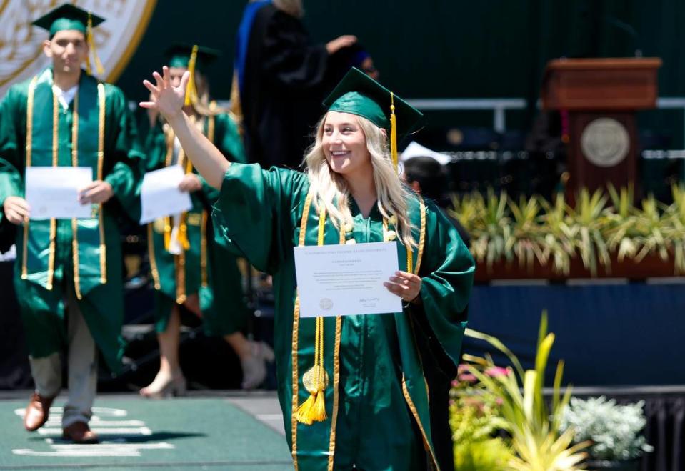 Cameron Avvakumovits waves on Saturday as Cal Poly honored more than 5,000 graduating students in six ceremonies on June 17 and 18, 2023, at Alex G. Spanos Stadium.