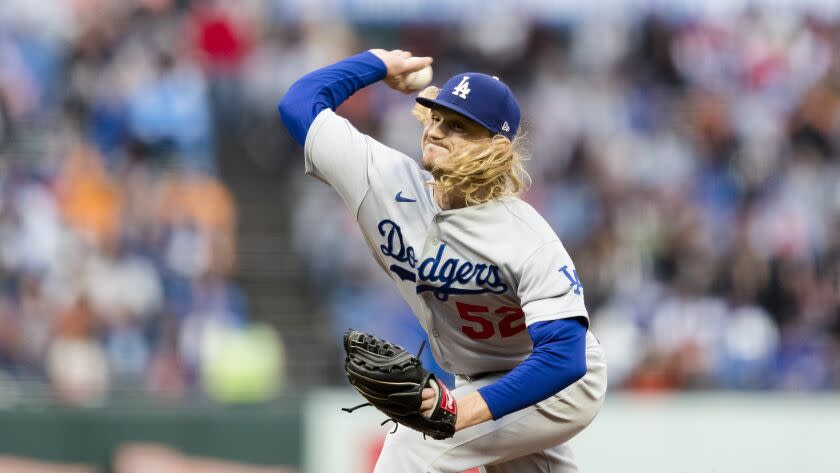 Los Angeles Dodgers relief pitcher Phil Bickford throws.