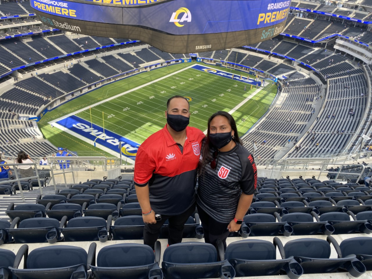 Rams fans Alfredo and Whitney Lopez at SoFi Stadium.