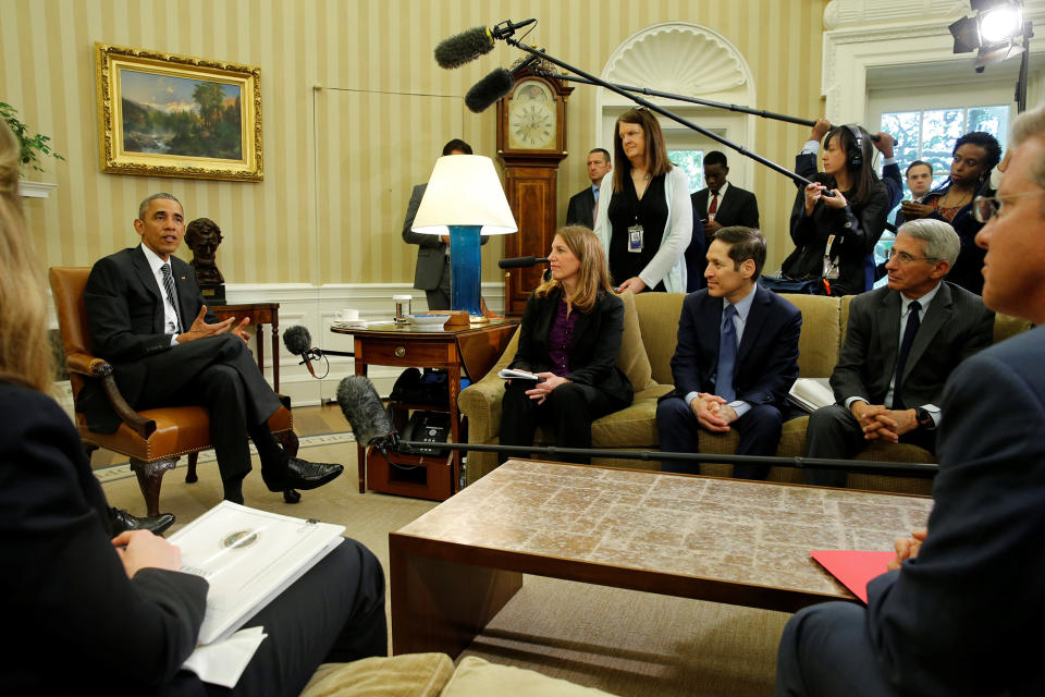 <p>U.S. President Barack Obama (L) talks to reporters after a briefing on the administration’s response to the Zika virus from Health and Human Services Secretary Sylvia Burwell (3rd R), Centers for Disease Control and Prevention (CDC) Director Tom Frieden (2nd R) and Anthony Fauci (R) of the National Institutes of Health (NIH), in the Oval Office at the White House in Washington, May 20, 2016. (Jonathan Ernst/REUTERS) </p>
