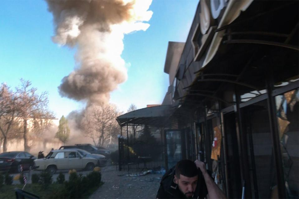 A column of smoke rises into the sky after a second Russian missile attack in Zaporizhzhia, Ukraine on April 5, 2024. The Russian army attacked the city twice with missiles. One of the strikes occurred while police, rescue workers and journalists were working at the scene. A total of five missiles were launched at Zaporizhzhia. (Vladyslav Kiyashchuk/Suspilne Ukraine/JSC "UA:PBC"/Global Images Ukraine via Getty Images)