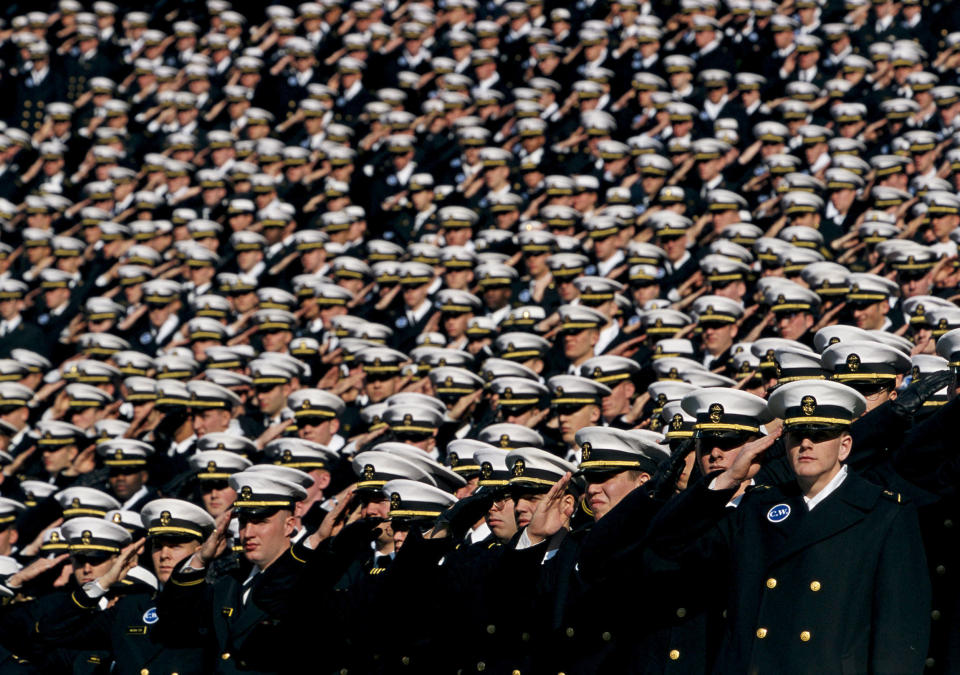 Image: Midshipmen from the Naval Academy at the Army-Navy football game in Philadelphia in 1999. (Ezra Shaw / Getty Images file)