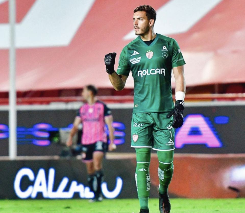 a man in a green uniform