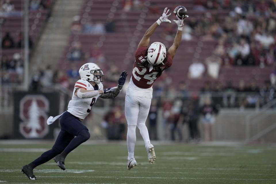 Stanford wide receiver Tiger Bachmeier, right, catches a pass while defended by Arizona safety Gunner Maldonado during the second half of an NCAA college football game Saturday, Sept. 23, 2023, in Stanford, Calif. (AP Photo/Godofredo A. Vásquez)