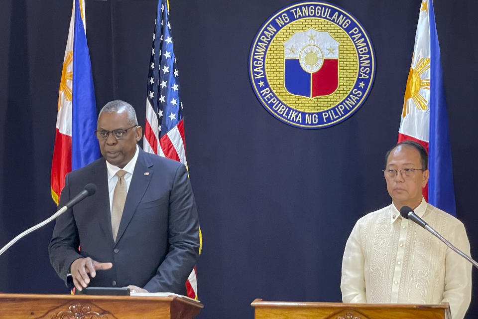 U.S. Defense Secretary Lloyd Austin, left, talks beside his Philippine counterpart, Carlito Galvez Jr. at a joint press conference in Camp Aguinaldo military headquarters in metro Manila, Philippines on Thursday, Feb. 2, 2023. The United States and the Philippines announced on Thursday an agreement to expand American military presence in the Southeast Asian country, where U.S. forces would be granted access to four more Philippine military camps, effectively giving them new ground to ramp up deterrence against China's increasingly aggressive actions toward Taiwan and in the disputed South China Sea. (AP Photo/Joeal Calupitan,Pool)