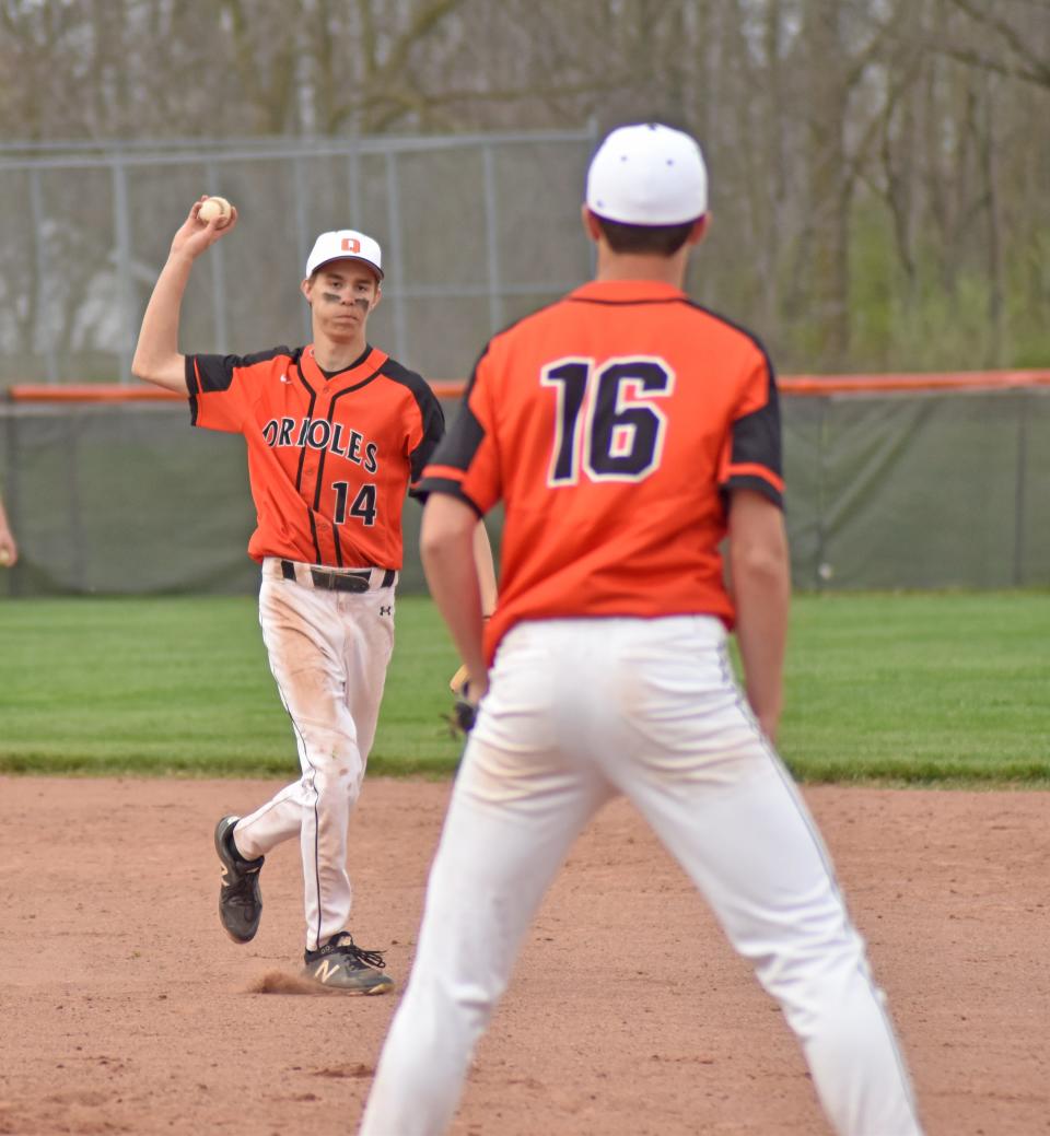 Alex Barry, shown here flipping to first in early season action, hit a key walk off two run single to give his Orioles the win over Springport on Tuesday