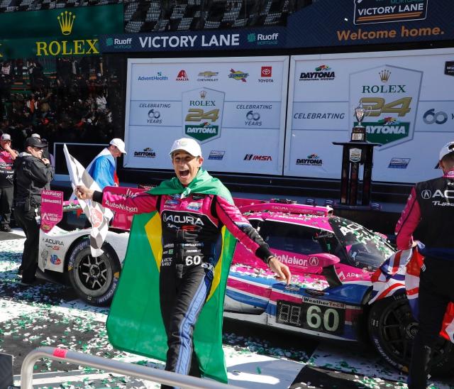 CLIMB THE FENCE Helio Castroneves holds off Ricky Taylor to win Rolex