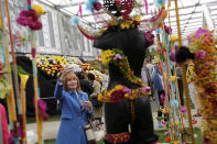 <p>A visitor takes a photo of a floral display at the Chelsea Flower Show in London on May 24, 2016. (Stefan Wermuth/Reuters) </p>