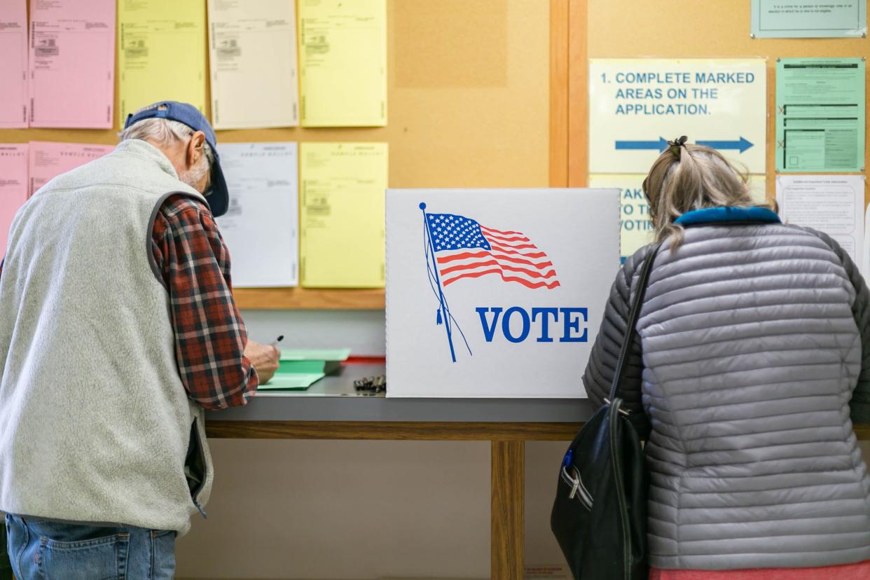 Janice and Bruce Eberhard vote during early voting on March 31, 2022, at the Oklahoma County Election Board.