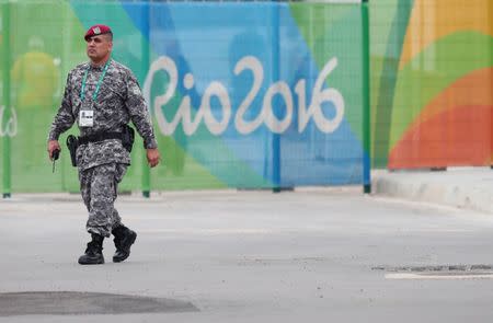 Jul 29, 2016; Rio de Janeiro, BRAZIL; Brazilian military patrol inside the Olympic Park prior to the start of the Rio 2016 Olympic Games. Rob Schumacher-USA TODAY Sports