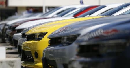 A group of Chevrolet Camaro cars for sale is pictured at a car dealership in Los Angeles, California April 1, 2014. REUTERS/Mario Anzuoni