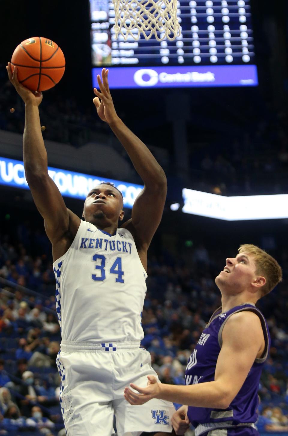 Kentucky’s Oscar Tshiebwe goes for the basket against Kentucky Wesleyan’s Ben Sisson..Oct. 29, 2021