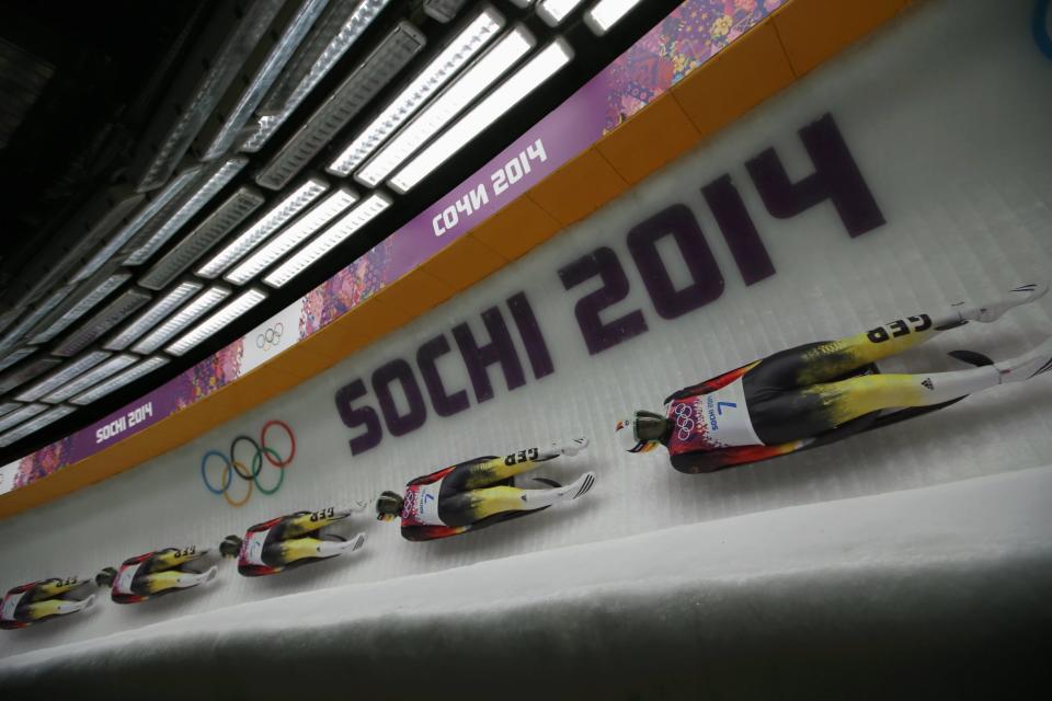 Germany's Anke Wischnewski speeds down the track in the women's singles luge event of the Sochi 2014 Winter Olympic Games, at the Sanki Sliding Center, Rosa Khutor February 10, 2014. Picture taken using multiple exposure. REUTERS/Fabrizio Bensch