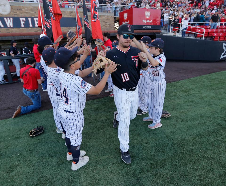 Texas Tech designated hitter Ty Coleman (10) takes the field before the Red Raiders' series opener Friday against Baylor. In five games last week, Coleman had eight hits, including three home runs and four doubles. He drove in seven runs and scored 10.