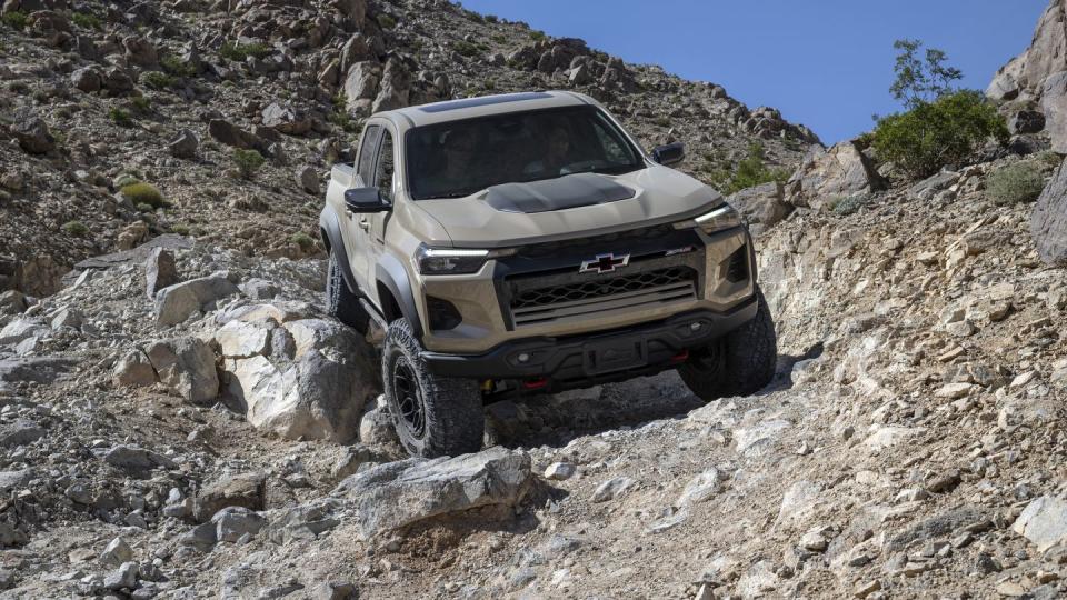 the 2024 colorado zr2 bison rock crawling on an off road trail