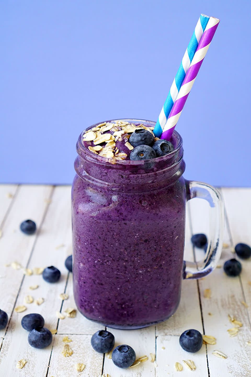 <p>If you're trying to cut out pastries, this smoothie is the next best thing. </p><p>Get the<strong> <a href="https://www.happinessishomemade.net/healthy-blueberry-muffin-smoothie-recipe/" rel="nofollow noopener" target="_blank" data-ylk="slk:Blueberry Muffin Smoothie recipe;elm:context_link;itc:0;sec:content-canvas" class="link ">Blueberry Muffin Smoothie recipe</a></strong> from Happiness is Homemade. </p>