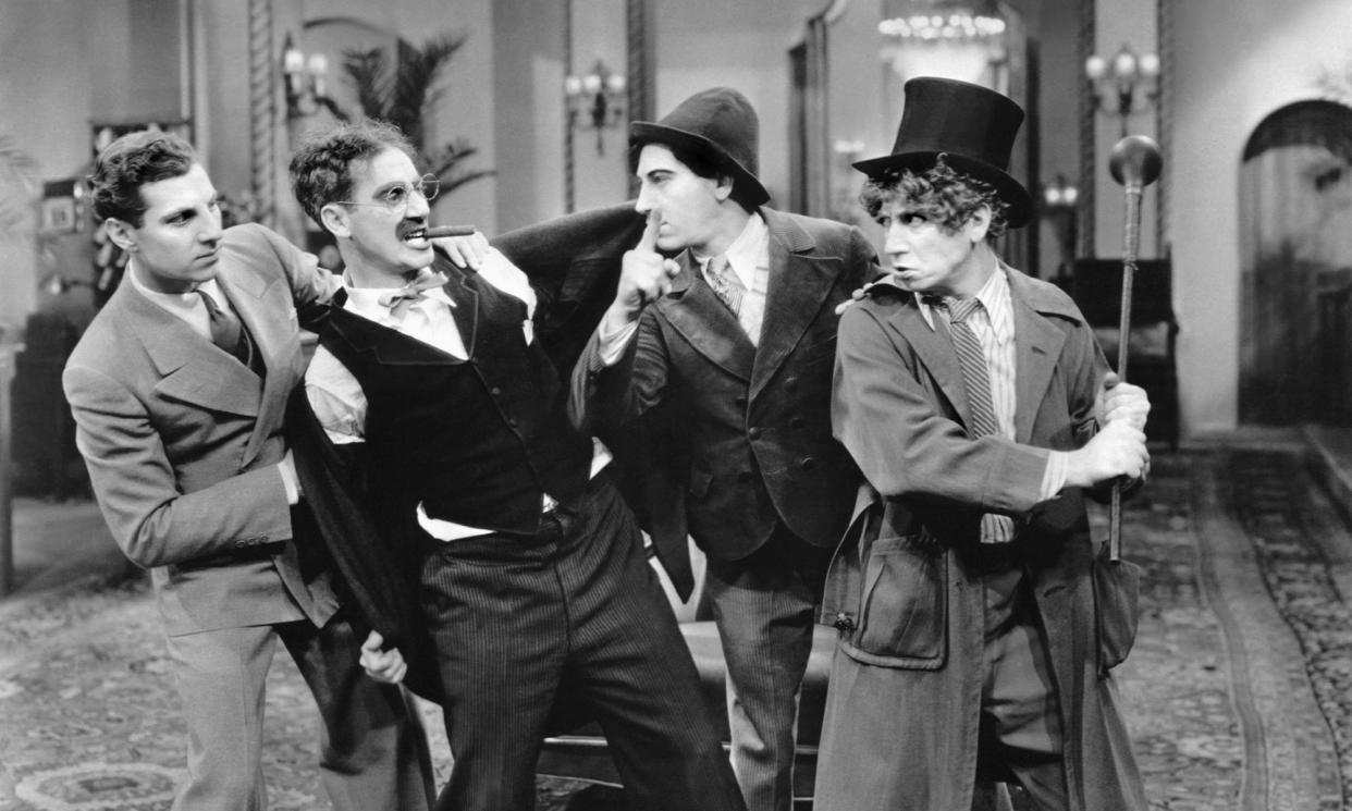 <span>From left: Zeppo, Groucho, Chico and Harpo Marx in The Cocoanuts.</span><span>Photograph: Paramount/Allstar</span>