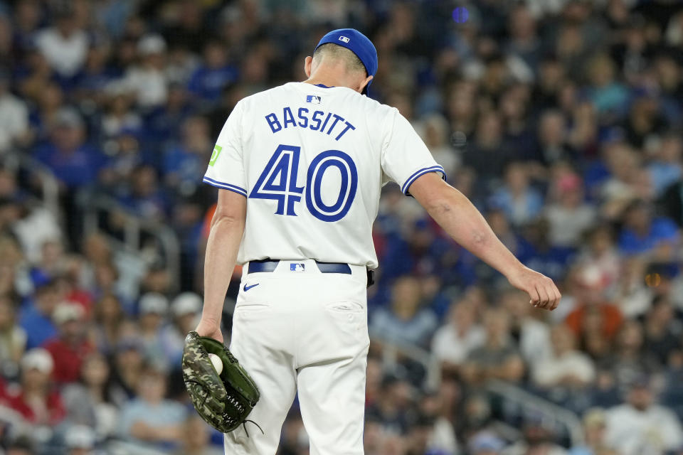 Toronto Blue Jays pitcher Chris Bassitt (40) sports a mark on his right arm where a line drive off the bat of New York Yankees' Aaron Judge (99) hit him during the first inning of a baseball game in Toronto, Saturday, June 29, 2024. (Frank Gunn/The Canadian Press via AP)