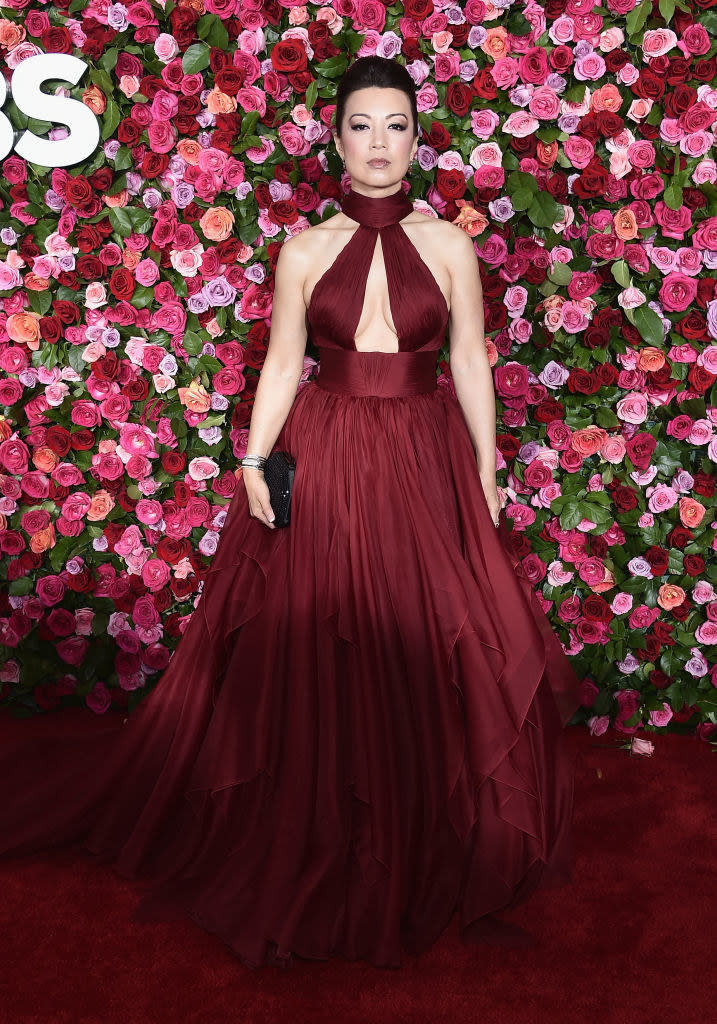 I think I deserve to be paid extra for the creepy-AF tabloid story about this dress that popped up while I was looking for the designer (not linking to the site because fuck them). There's so much to love here: the deep crimson color, the fit of the keyhole top, the way the skirt cascades. 