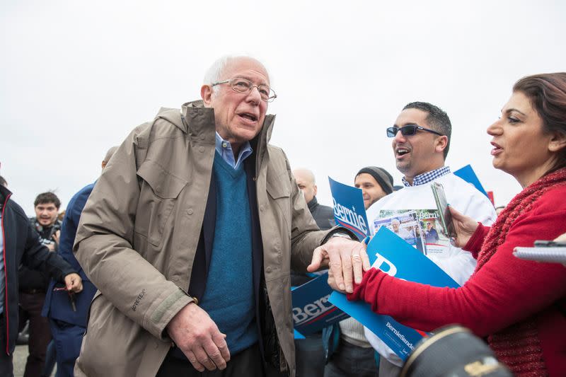 U.S. Democratic presidential candidate Bernie Sanders greets supporters outside of a polling station in Dearborn Heights, Michigan