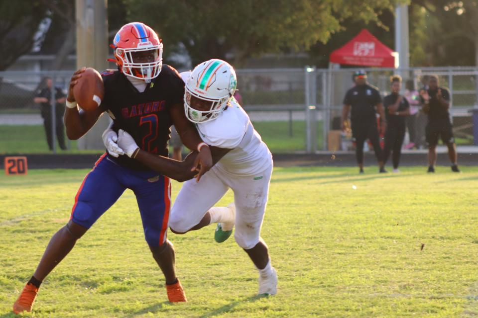 Florida State commit Jayden Parrish gets a sack against Palm Beach Gardens in Atlantic's 21-14 win on Friday.