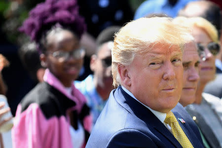 U.S. Donald Trump attends an event to celebrate the anniversary of first lady Melania Trump's “Be Best” initiative in the Rose Garden at the White House in Washington, U.S., May 7, 2019. REUTERS/Clodagh Kilcoyne