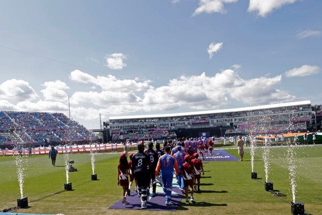 India and US players walk out at the Nassau County International Cricket Stadium