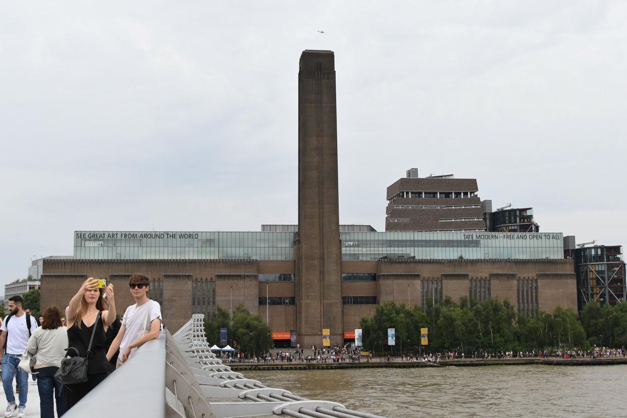 A general view shows the Tate Modern gallery on the southern bank of the River Thames in London on August 4, 2019 after it was put on lock down and evacuated after an incident involving a child falling from height and being airlifted to hospital. - London's Tate Modern gallery was evacuated on Sunday after a child fell "from a height" and was airlifted to hospital. A teenager was arrested over the incident, police said, without giving any details of the child's condition. (Photo by Daniel SORABJI / AFP)        (Photo credit should read DANIEL SORABJI/AFP/Getty Images)