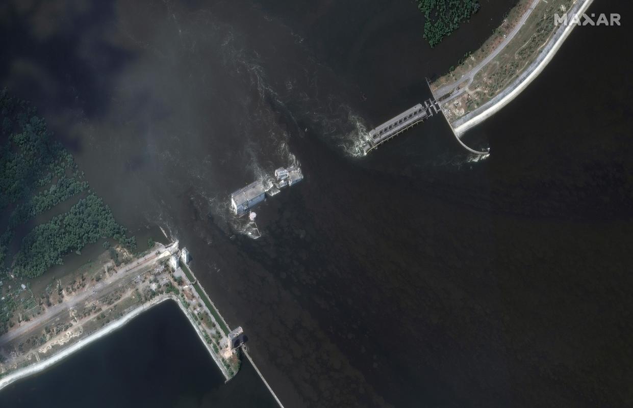 This image provided by Maxar Technologies, shows the Kakhovka dam and station in Ukraine after its collapse, on June 7, 2023 (Satellite image ©2023 Maxar Technologies)