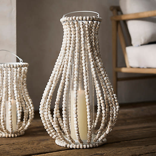 <p><a href="https://go.redirectingat.com?id=74968X1596630&url=https%3A%2F%2Fwww.shopterrain.com%2Fproducts%2Fbeaded-lantern&sref=https%3A%2F%2Fwww.housebeautiful.com%2Fshopping%2Fhome-accessories%2Fg22487578%2Foutdoor-lanterns%2F" rel="nofollow noopener" target="_blank" data-ylk="slk:Shop Now;elm:context_link;itc:0;sec:content-canvas" class="link ">Shop Now</a></p><p>Beaded Lantern</p><p>$58.00</p><p>shopterrain.com</p><span class="copyright">Terrain</span>