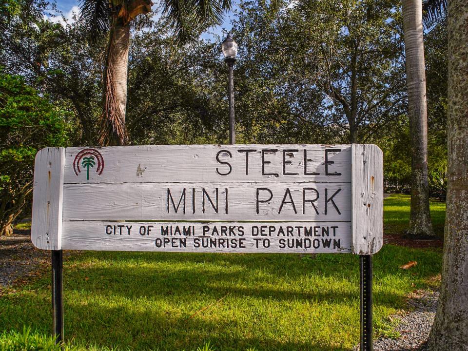 A sign for Steele Mini Park in Coconut Grove