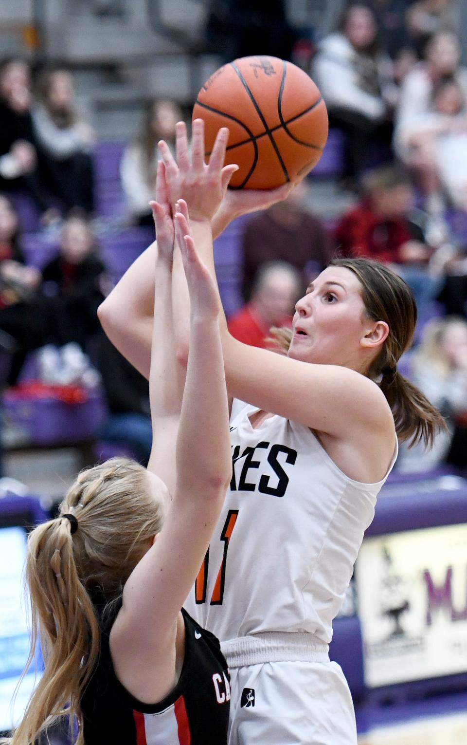 Marlington's Chelsea Evanich hits 2 in the  first half against Canfield in DII Girls Basketball District Semifinal at Barberton High Schoot.  Tuesday,  February 28, 2023.